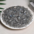 Polished grey labradorite crystal stones with blue flashes in a white display plate - Gray Moonstone (5-7mm) 100g