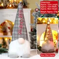 Standing Christmas gnome with gray plaid hat and Merry Christmas text and warm LED lighting - Lighted - Grey Plaid Merry Christmas (D-404-B)