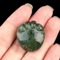 Dark green cat paw carving made of natural agate crystal stone with mineral texture - India Agate
