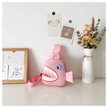 Detail of a pink cartoon shark crossbody bag for kids with 3D fins and shark teeth prints - Pink