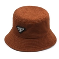Caramel brown seersucker bucket hat with a triangular logo badge and adjustable fit - Khaki