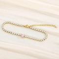 Gold-tone tennis bracelet with pink heart-shaped stone and white zircon stones - Gold White Stone (KB168998-Z)