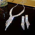 Elegant silver jewelry set with tassel necklace and drop earrings featuring sparkling crystals - Silver V-Shape Tassel Style