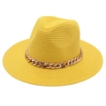 Detailed view of yellow woven straw Fedora hat with thick gold chain link decoration - One Size / Yellow