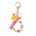 Floral resin letter O keychain with pink tassel and gradient butterfly charm in rose gold - Flower Pattern O
