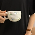 Hand-painted floral ceramic coffee mug with unique textured finish and colorful flowers - Pink and Blue Floral