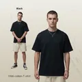 Men's oversized black T-shirt made of 190G pure cotton with a loose fit and round neck - S / Black