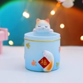 Blue cylindrical pen holder featuring a cute lucky cat holding a lucky Fu character tag - Lucky Blue Cat (2021-9A Blue)