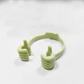 Light green thumb-up shaped portable phone holder stand with flexible dual-hand design - Nordic Green