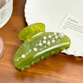 Elegant green pearl hair claw clip with rhinestones on a wooden desk background - 8.6cm / Green