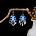 Ethnic bohemian silver alloy drop earrings with blue flower petals and small silver bells - Blue Silver Petal Bell Tassel(E5828)