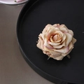 Elegant beige and pink gradient fabric rose hair clip shown from a top-down view - Gejiao Rose / Apricot