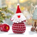 Knitted Santa Claus drawstring gift bag with festive snowflake pattern for Christmas treats - Santa Claus / Red Knitted Santa Claus