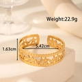 Minimalist gold stainless steel open bangle with star and moon hollowed-out engravings - Star Moon Pattern Style (YB-024)