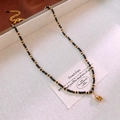 French style necklace with black and gold beads featuring a golden tulip flower pendant - 7# Necklace - Black - Conch