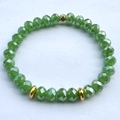 Elastic single-strand DIY bracelet with faceted green glass beads and golden accents - Faceted Green & Gold Bead