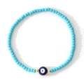 Pulsera artesanal de cuentas azul claro con amuleto de ojo turco y separadores dorados - Mal de Ojo Azul Claro