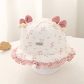 Dettaglio cappello sole bimba con stampe ciliegie, fiocchi rosa e pompon - 48cm (5-20 mesi) / Rosa