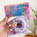 Lila Donut Quetschspielzeug mit buntem Glitzer und Sternen, Größe 8x8x3cm - Lila Donut