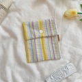 Floral seersucker sanitary pad pouch with yellow and blue stripes and snap button - Bubble Yellow Stripes