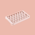 Rosa runde Eiswürfelform mit 33 Kugel-Slots zur Herstellung von runden Eiskugeln - Mittel / Rosa