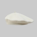 Detail view of cream-white wool beret hat showing soft texture and premium fabric weave - One Size / Milky White