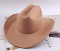 Classic khaki wool felt cowboy hat with rolled brim placed on Kinfolk books - Minimalist Plain / Khaki