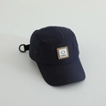 Detailed view of dark blue 5-panel cap with kindness smiley patch and metal eyelets - 52cm / Navy Blue