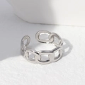 Silver chain link style stainless steel open ring displayed on white textured surface - US Size 7 (Adjustable) / Steel