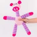 Pink plush pig pet toy with purple striped legs and squeaky texture for dogs - Pink Purple Pig