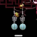Ethnic vintage turquoise drop earrings with silver butterfly and teardrop stone detail - 19-Butterfly Round Bead