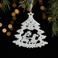 Glittery white Christmas tree ornament with reindeer carving and festive bokeh background - Tree Shape
