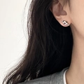 Minimalist silver knot stud earrings in a polished twisted geometric design for women - Silver
