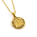 Detailed macro view of 18k gold vintage filigree round pendant with letter I engraving - Letter J