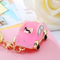 Pink rhinestone beetle car keychain with gold metal ring and decorative crystals - Crystal Car Pink