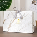 Elegant marble pattern gift bag with grey ribbon and yellow heart icon for weddings - New Heart Marble