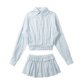 Macro detail of blue and white striped shirt collar with button-front and label - S / Striped
