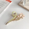 Elegant gold tulip hair claw clip with pink flowers and green leaves on white background - Pink Lily Claw Clip