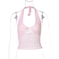 Dettaglio della trama in pizzo rosa e scollo a V del top corto da donna - S / Rosa