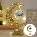 Golden hollow crescent moon lamp with silver disco ball bulb and warm LED lighting - Disco Moon Light