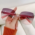 Fashionable rimless sunglasses for women with purple gradient lenses and gold metal accents - Pink Frame Gray Pink Lens