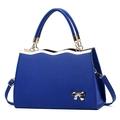 Royal blue bow tote bag with gold scalloped trim and adjustable shoulder strap - Royal Blue