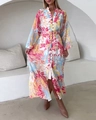 Detail of elegant floral long-sleeve dress with V-neck, buttons and matching belt - S / Rainbow