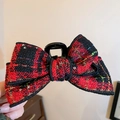 Plush cross hair claw clip featuring red, black, and gold sequin plaid woven fabric - Red Black Gold Plaid (Sequin Bow Hair Claw)