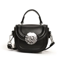 Kids black mini crossbody bag with round silver metal buckle and top handle design - Black