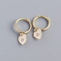Elegant gold-plated S925 silver hoop earrings featuring heart charms with starburst zircons - 925 Silver / Gold Color (Pair)