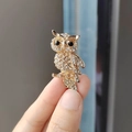 Exquisite golden owl brooch with sparkling rhinestones and black gem accents - Owl Brooch (XZ0084)