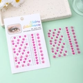 Macro detail of 3D pink heart and pearl gem stickers for face and nail art DIY decoration - Rose Red Heart Sunflower Rhinestone