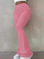 Detail view of pink high-waisted ribbed flare pants with slim-fit cut and elastic waist - Pink