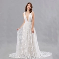 Elegant white lace wedding dress with V-neck sleeveless design and long floral train - US 2 / White